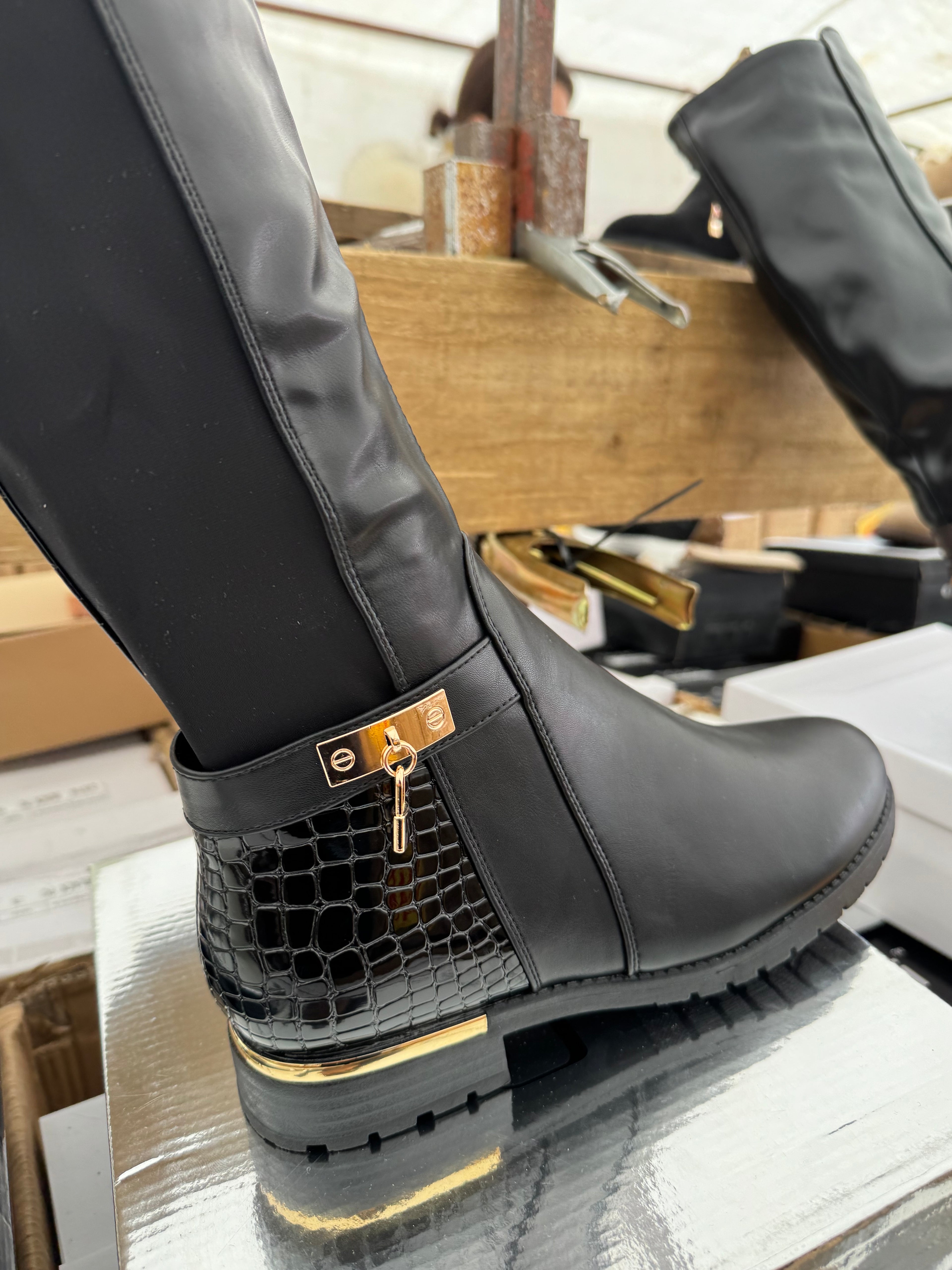 Knee high boots black and gold accent