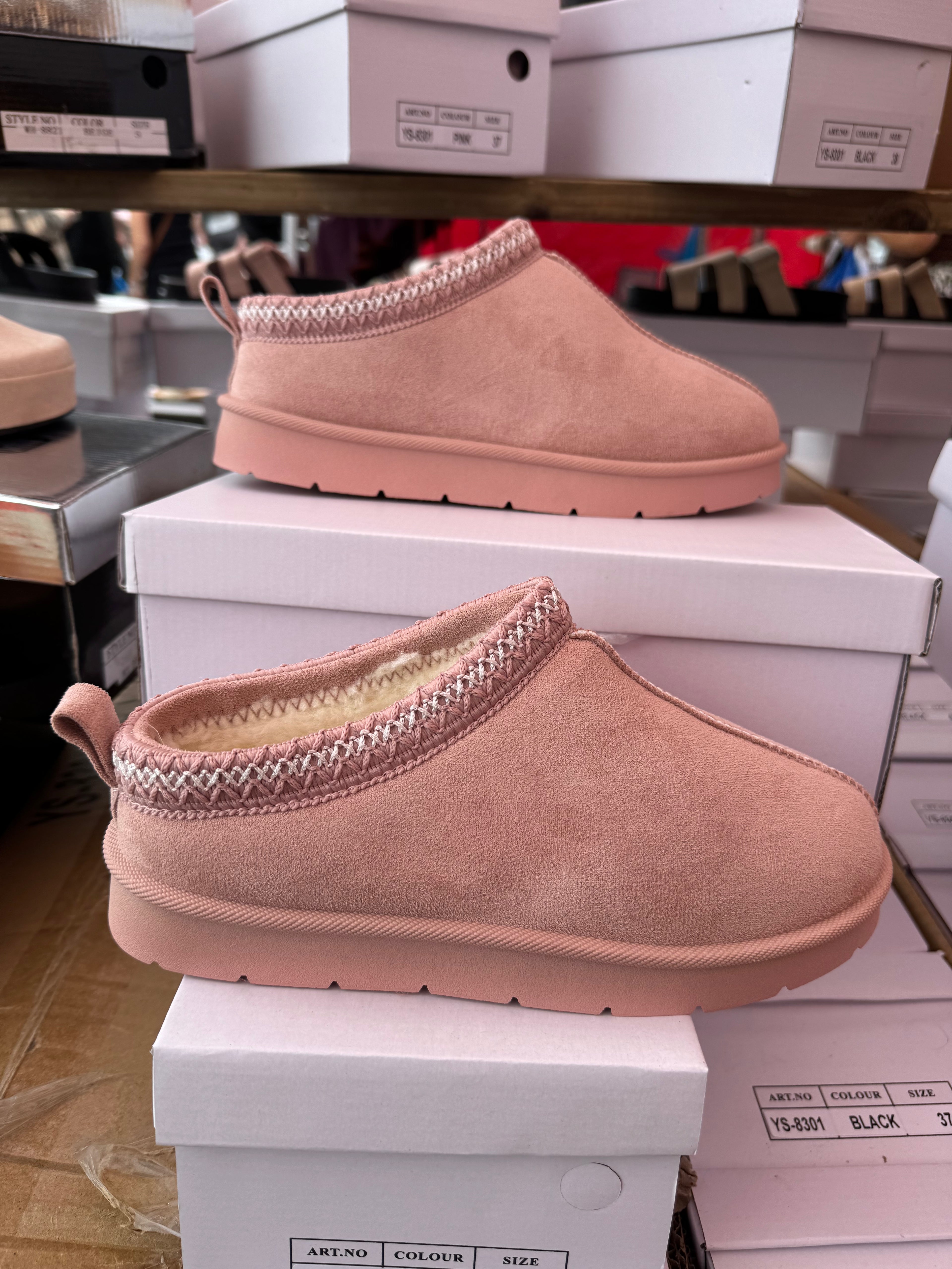 Winter boots with embroidered cuffs and faux fur lining to keep toes nice and toasty in the winter